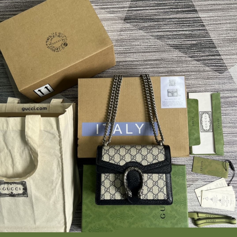 G*u*i top handle bags